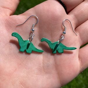 green dinosaur shrinky dink earrings